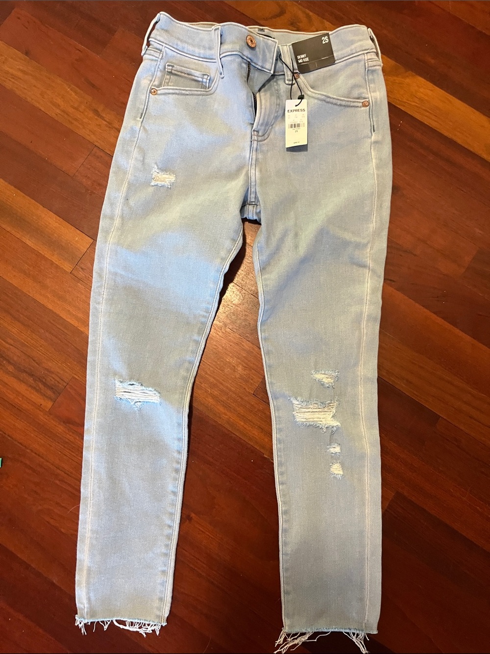 Express Women's Light Blue Distressed Skinny Jeans